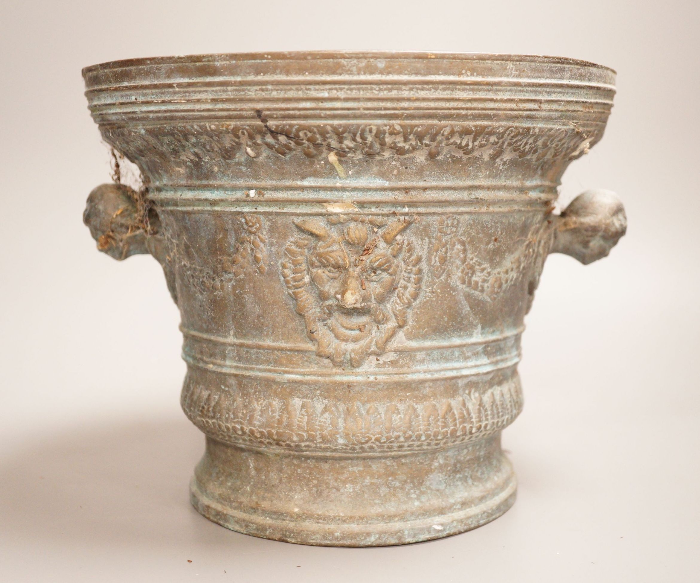 A bronze mortar, dated 1630, 21cm